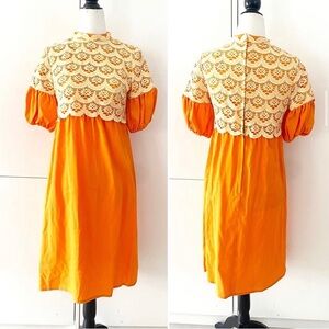 Vintage 1960s orange babydoll mini dress